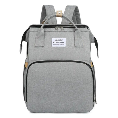 pañalera con cama portátil plegable